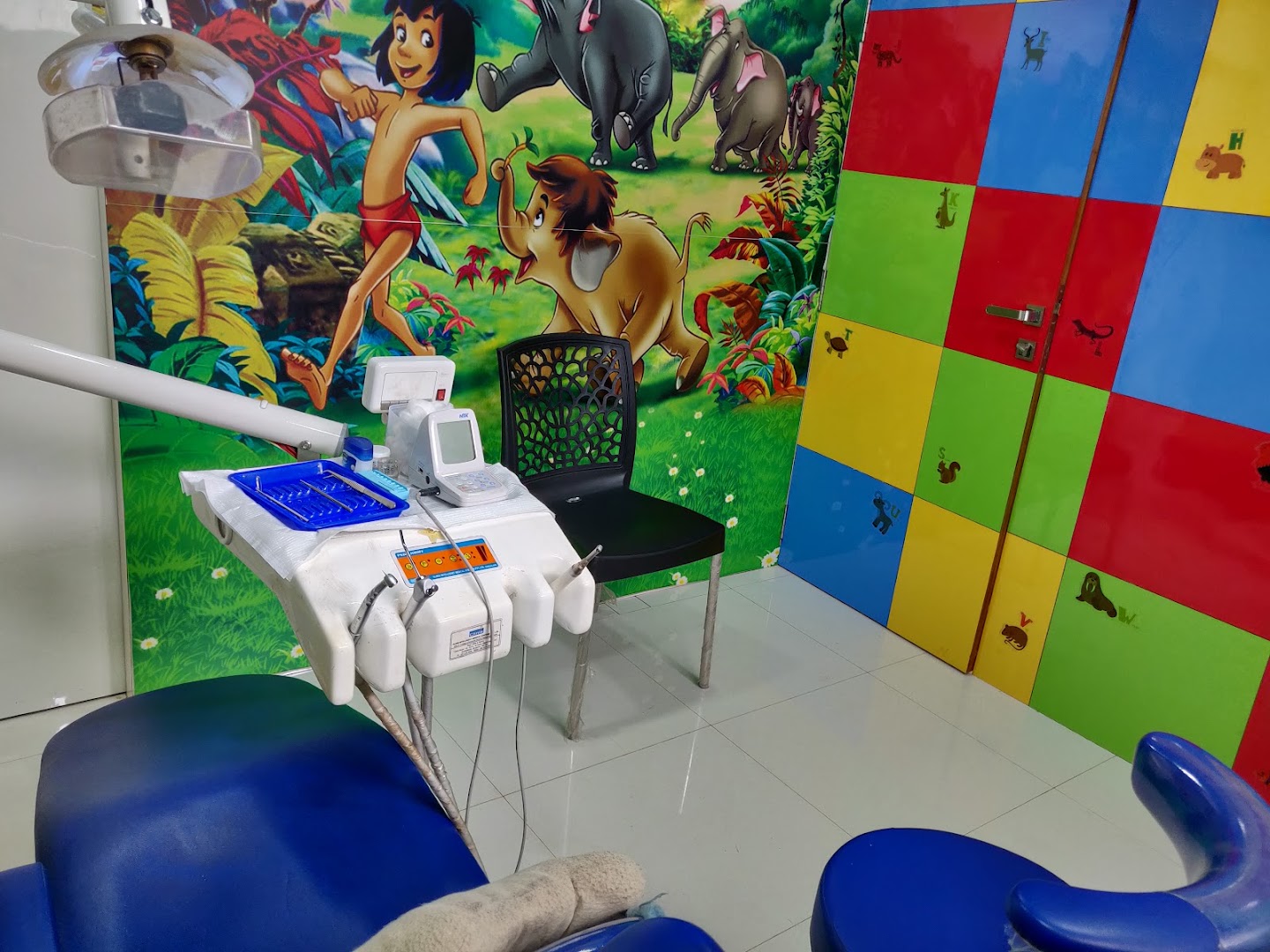 dr Joshi's Million Smiles Dental Clinic for kids and adults - Modern Clinic Interior Photo 3 in Nachane